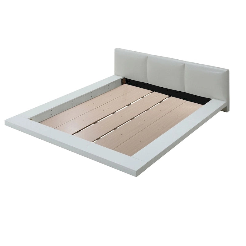 Lit rembourré bas profil blanc lustré
