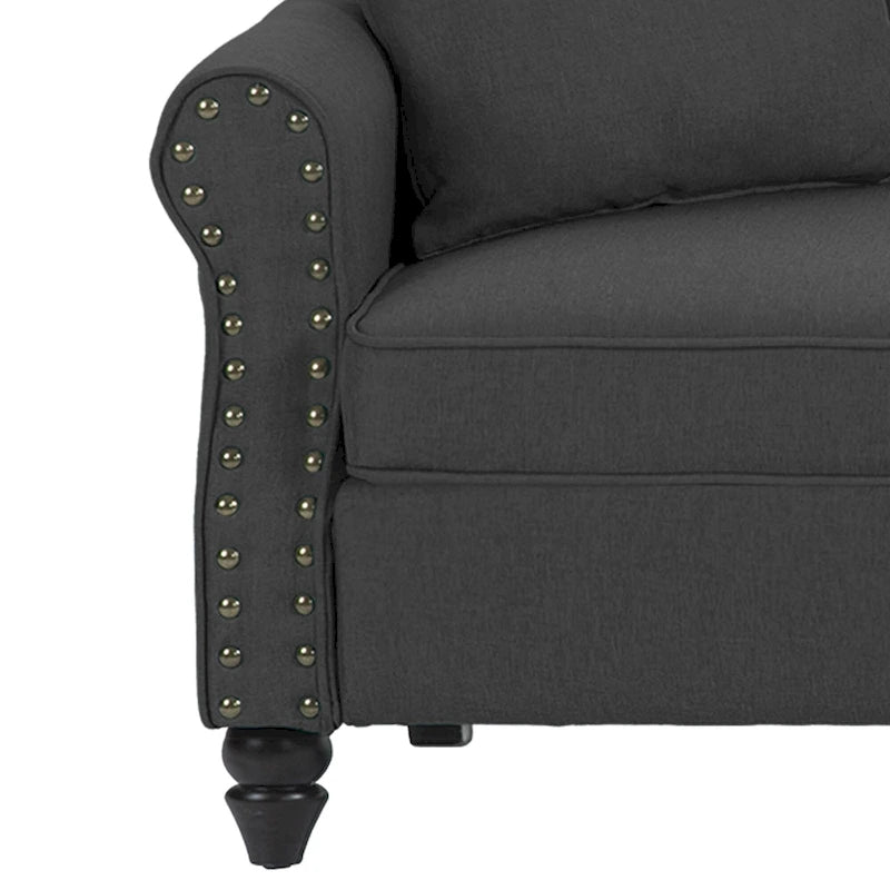 Canapé avec accoudoirs arrondis et clous décoratifs