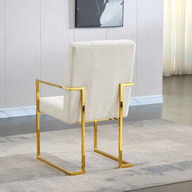 Chaise de salle à manger moderne en velours avec accoudoirs, capitonnée et base en acier inoxydable doré
