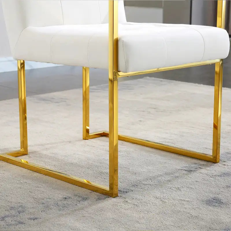 Chaise de salle à manger moderne en velours avec accoudoirs, capitonnée et base en acier inoxydable doré